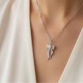 Opulent Pearl Bow Pendant